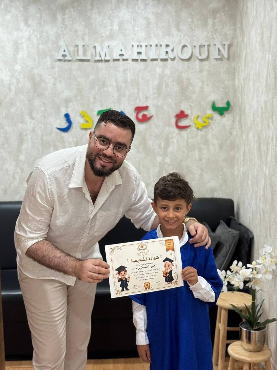 Student with graduation diploma