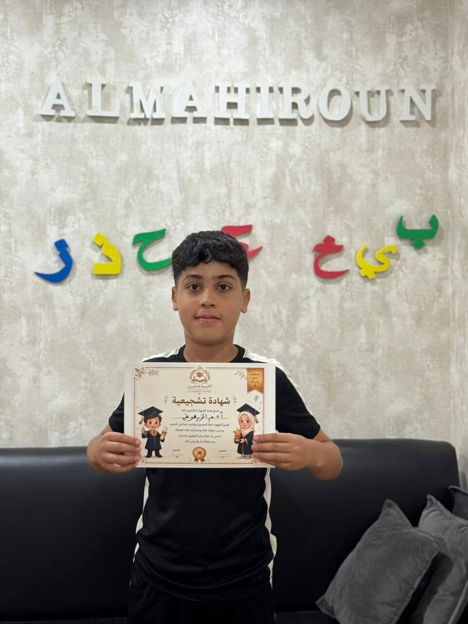 Student holding diploma