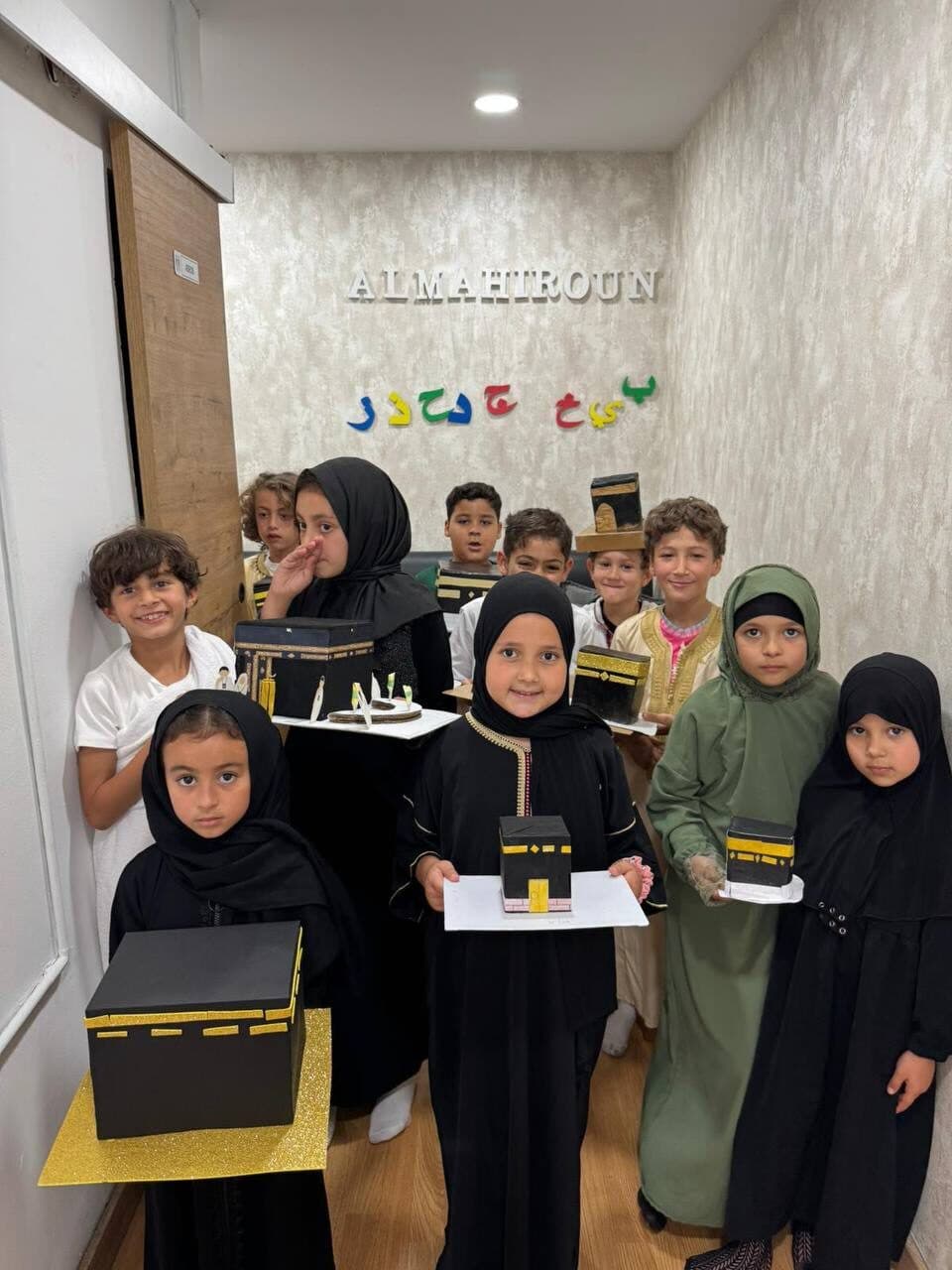 Children presenting Hajj activity projects